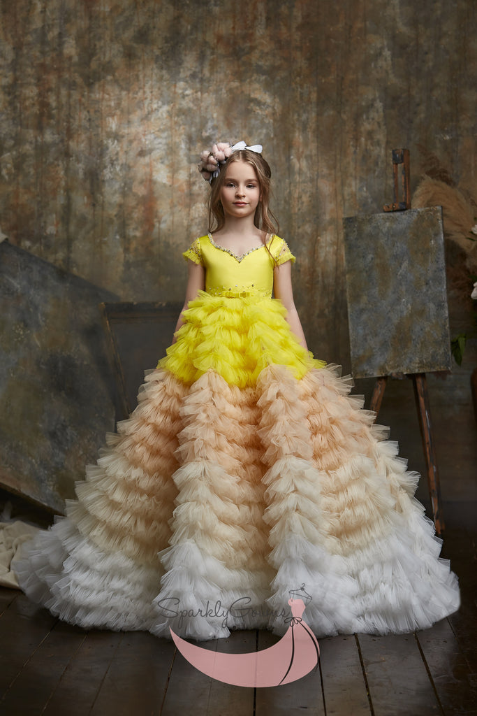 Premium Photo | Smiling cheerful little girl in a beautiful white ball gown  and sneakers sitting on the stairs to the outdoors